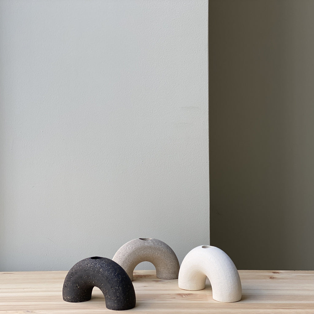 Gray Arch / Kertastjaki