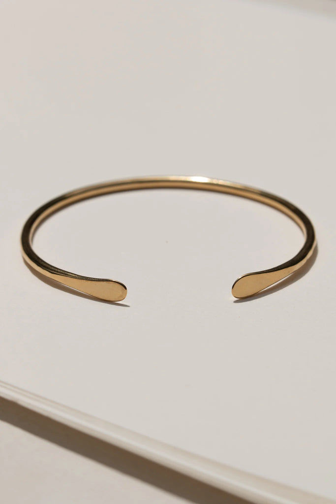 Mawoko armband / endurunnið gull og messing